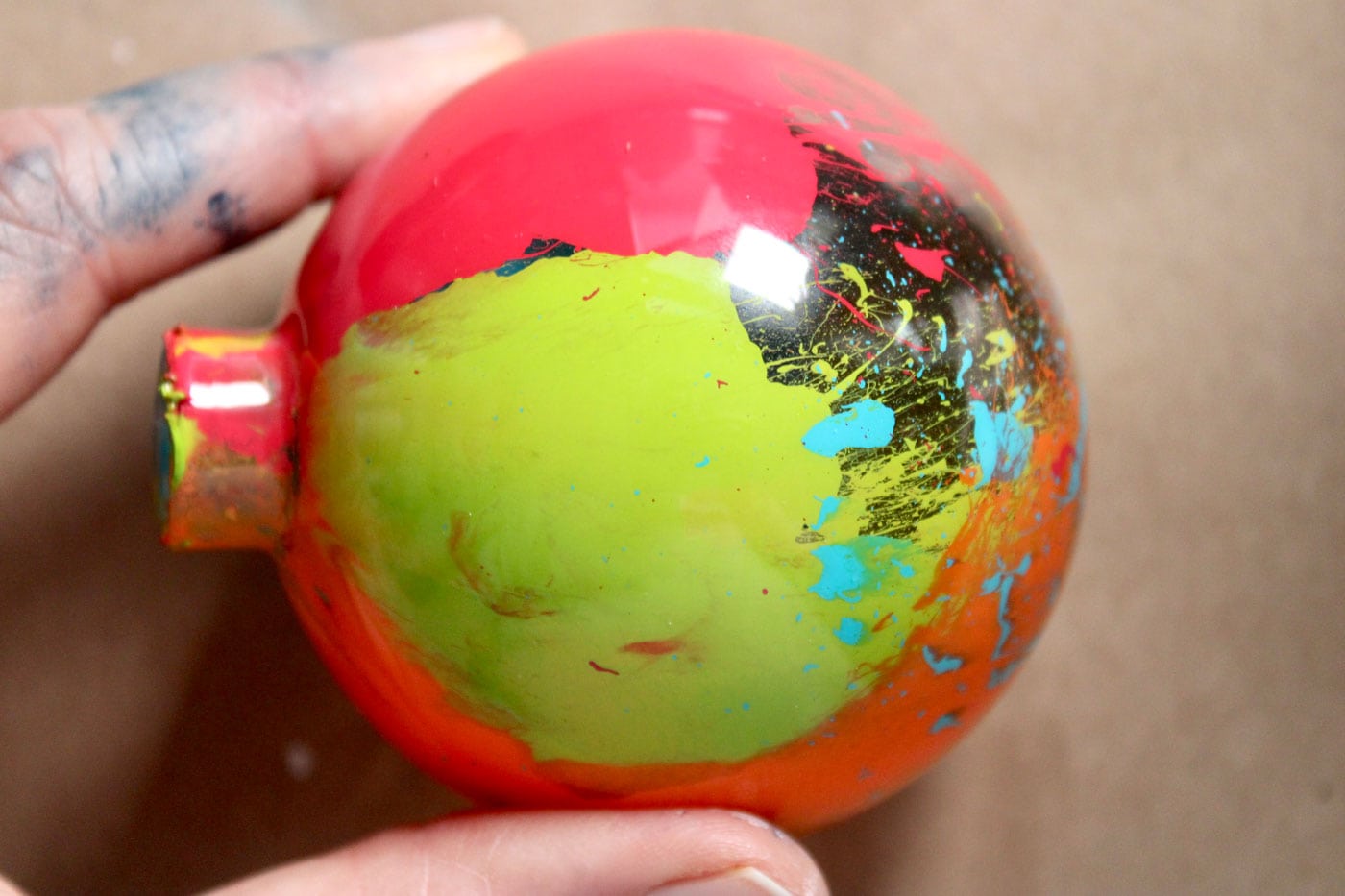 close up of paint inside of glass ornament