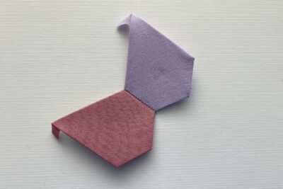 two gem shapes covered in fabric