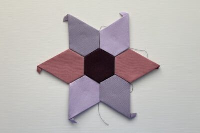 colorful basted star shaped EPP on table