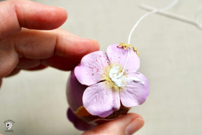 flower glued onto egg