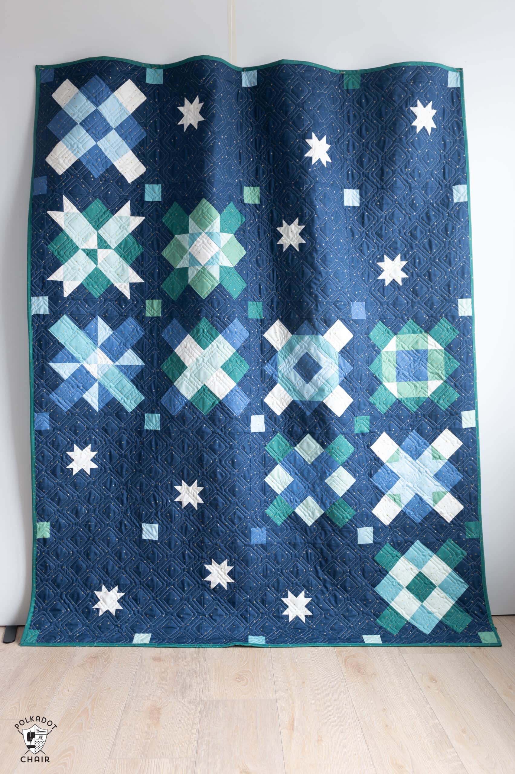 navy, blue and green quilt made from squares and rectangles - a modern granny square quilt pattern