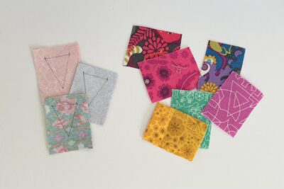 colorful fabric scraps on white tabletopo