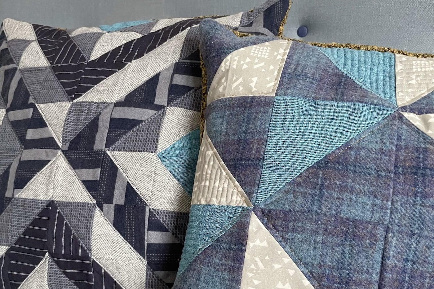 patchwork pillows in navy, cream and black