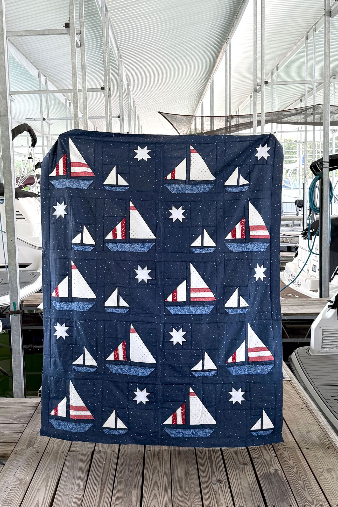 Navy blue quilt on boat dock