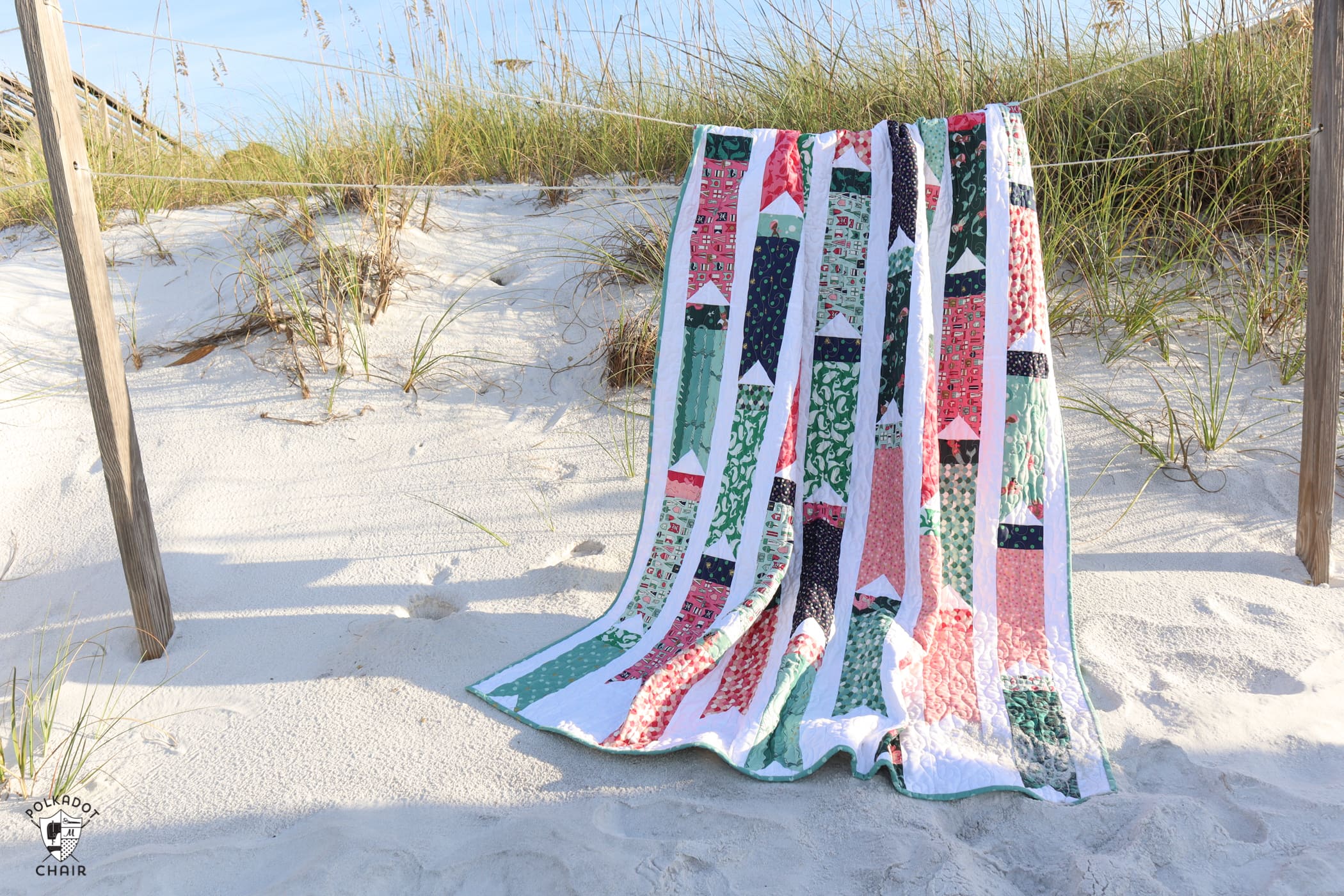 colorful flag quilt on beach