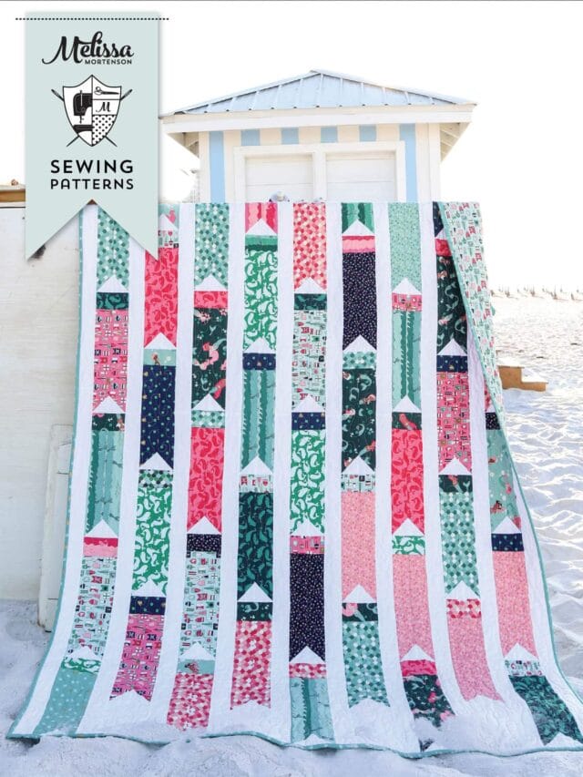 colorful flag quilt on beach