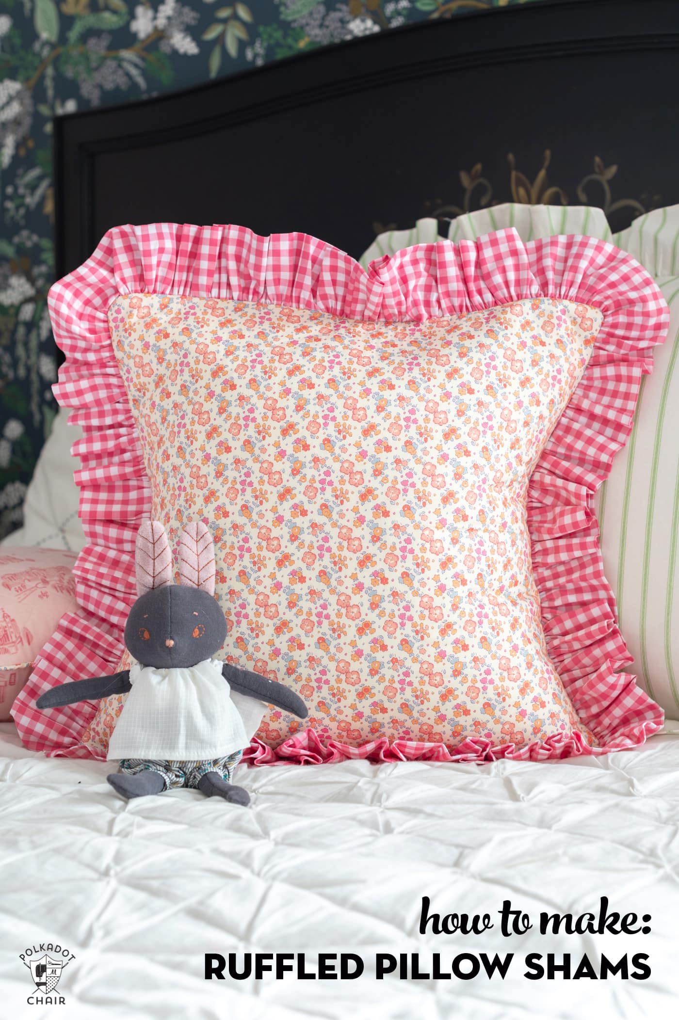 Pink and yellow ruffled pillow with stuffed animal on white bedding