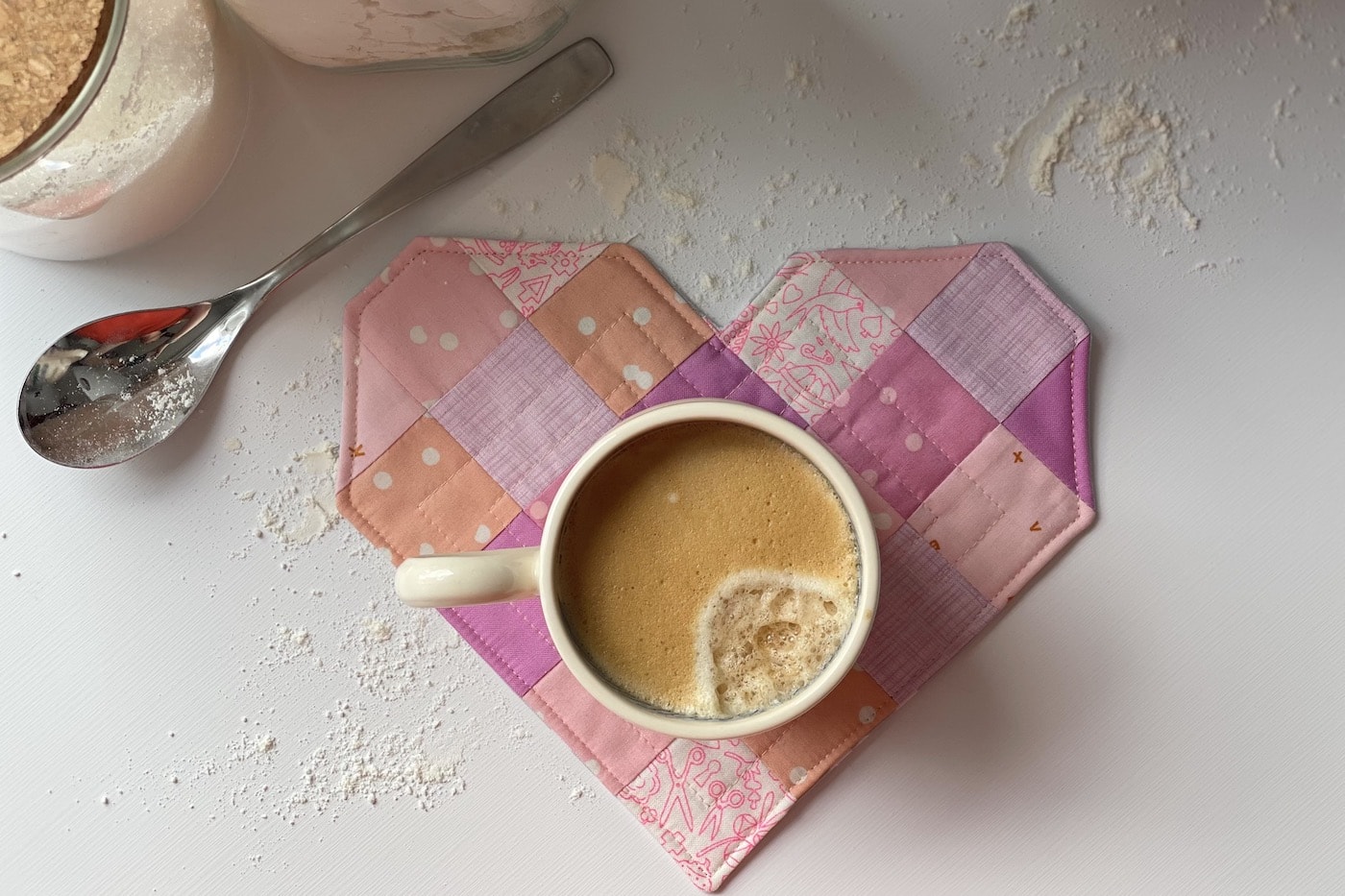 heart mug rug and mug on table