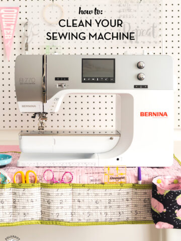 bernina sewing machine in front of white peg board