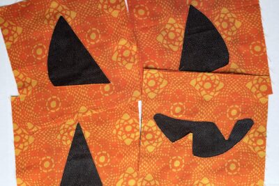 black and orange fabric on table - during construction