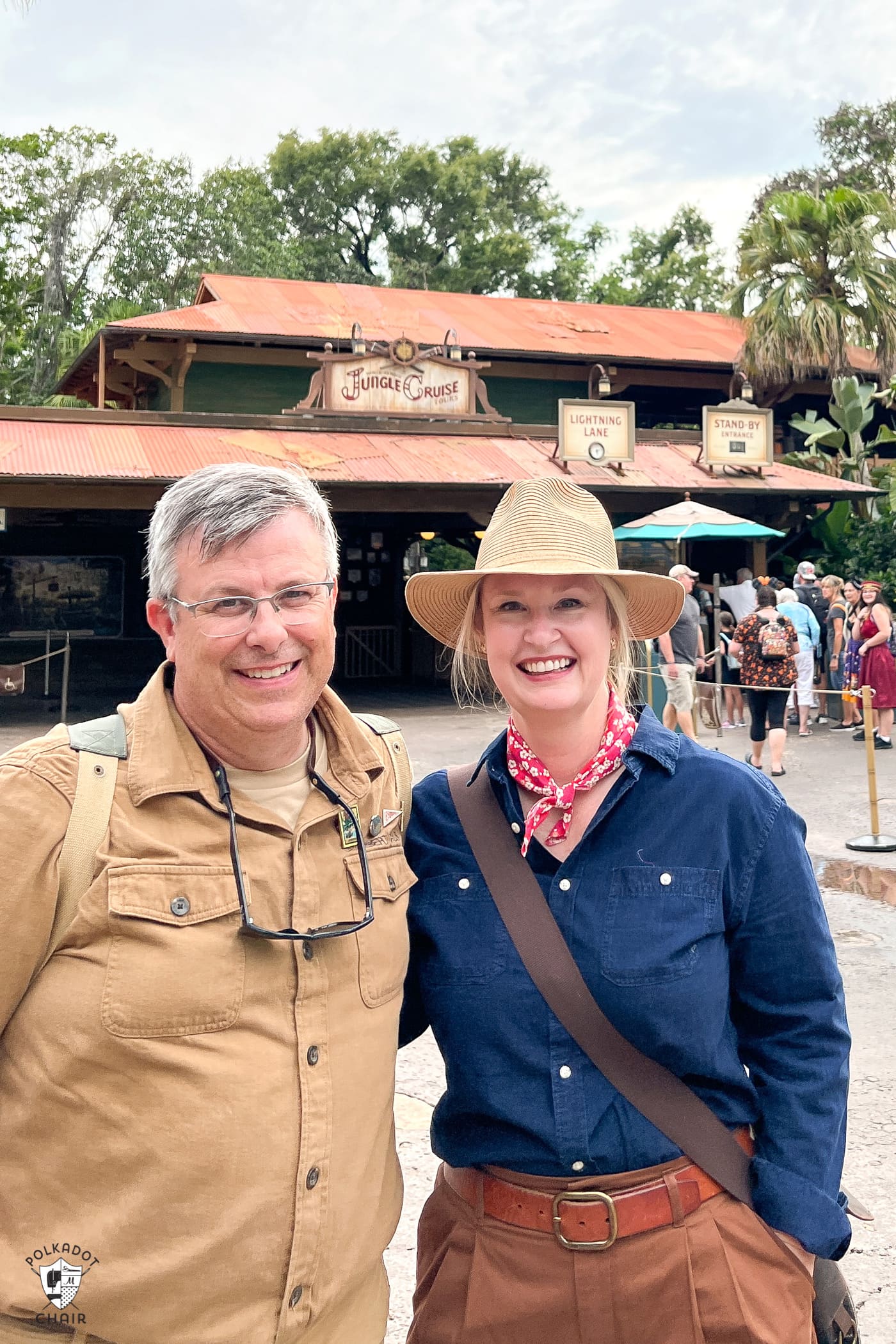 man and woman in front of jungle cruise ride
