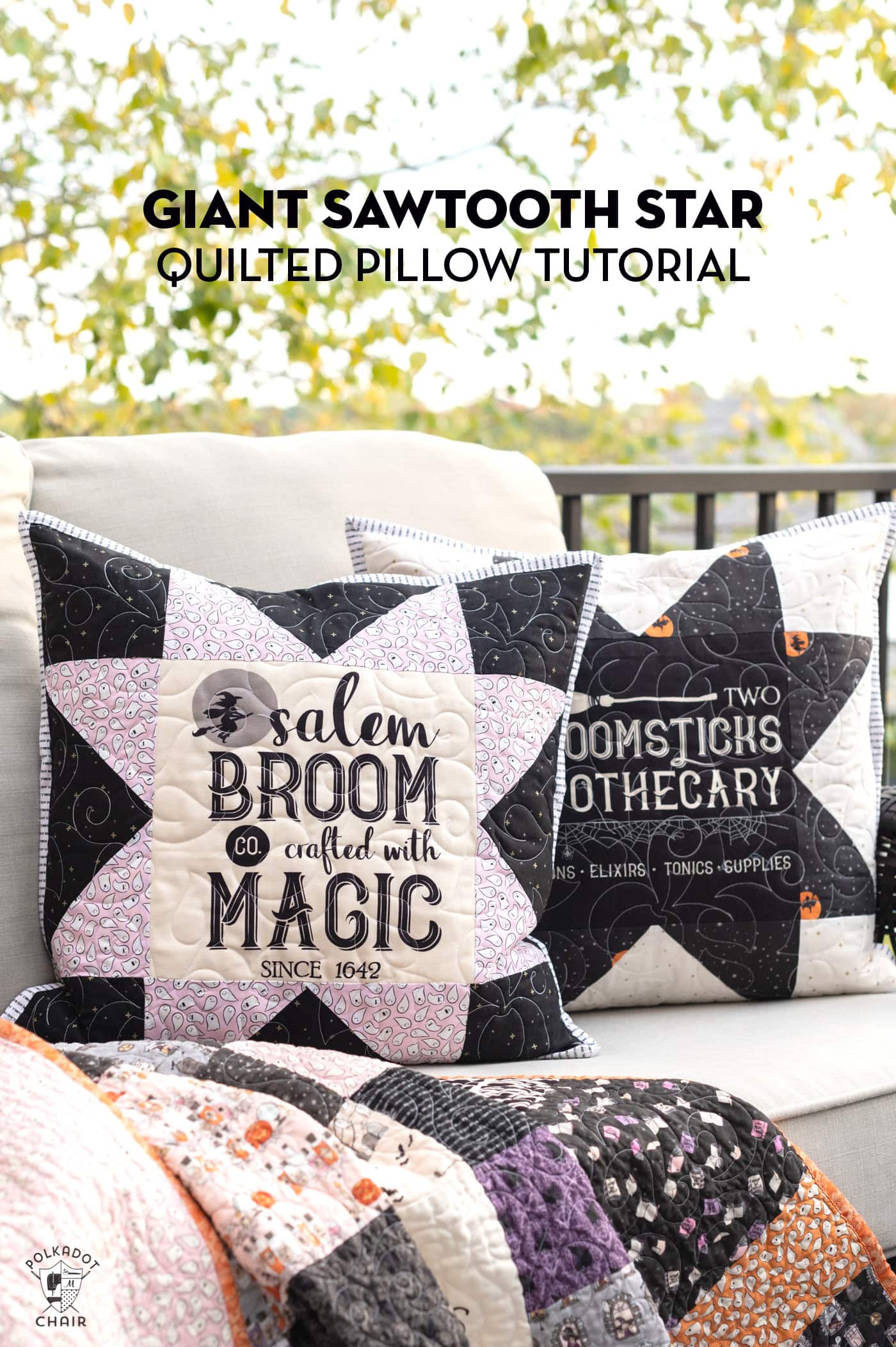 two black and white pillows on couch outdoors with halloween quilt