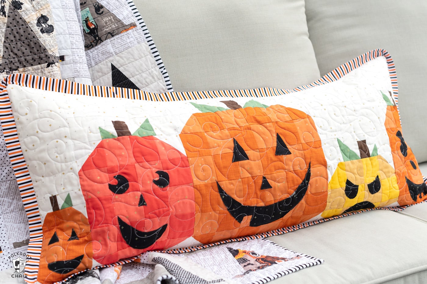 pumpkin pillow on sofa outdoors