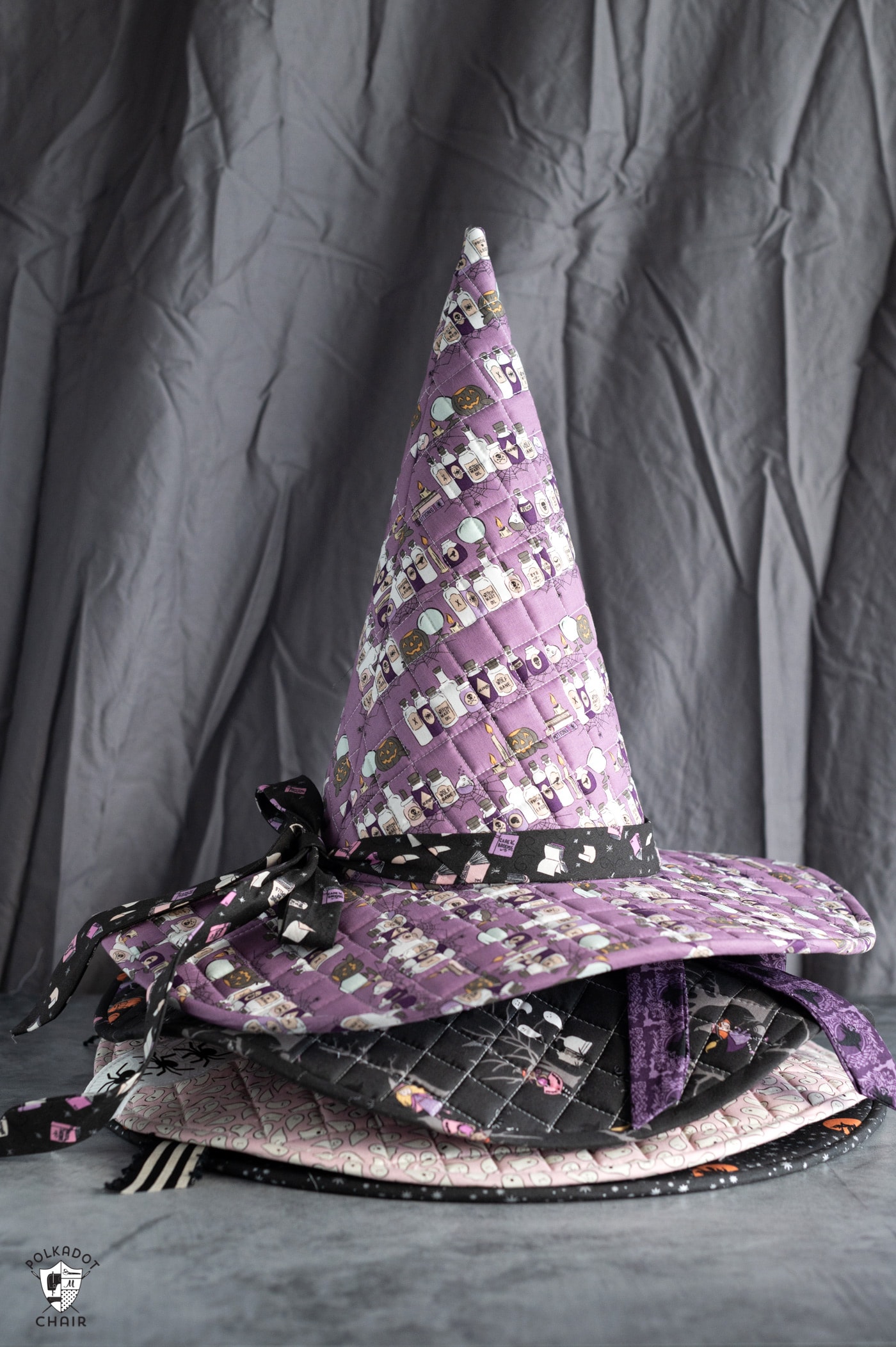 stack of quilted witch hats on table