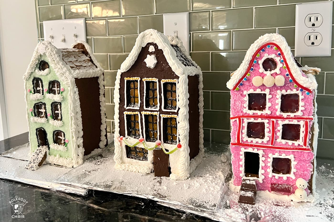 colorful gingerbread house on kitchen counter