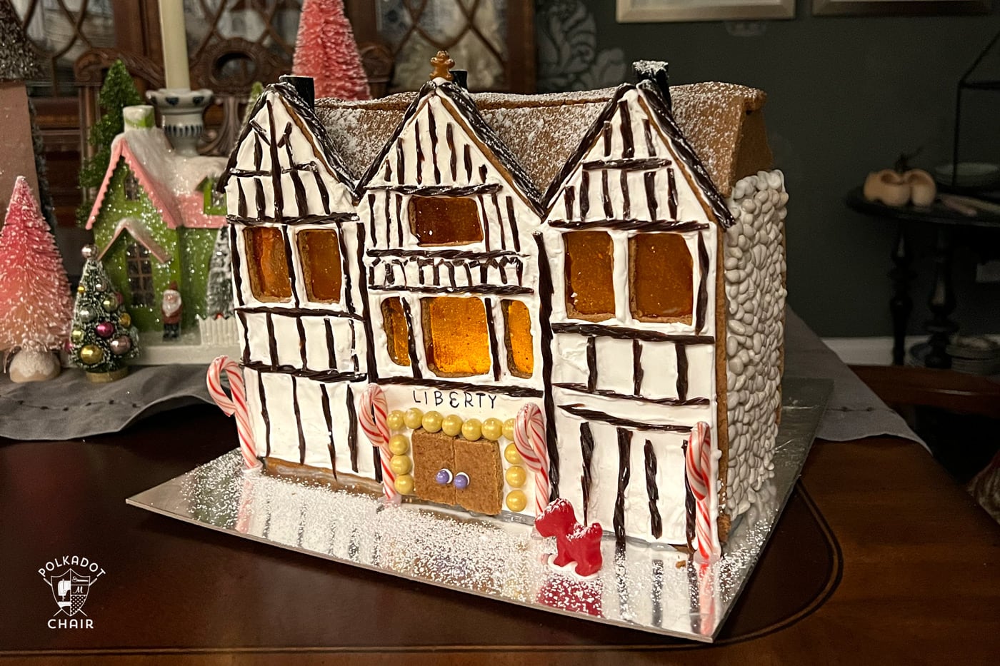 colorful gingerbread house on kitchen counter