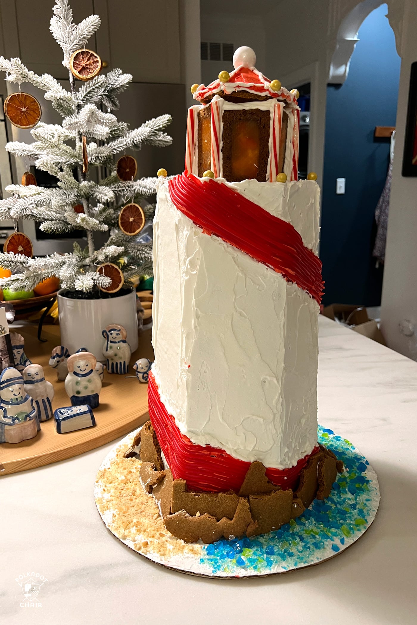 colorful gingerbread house on kitchen counter