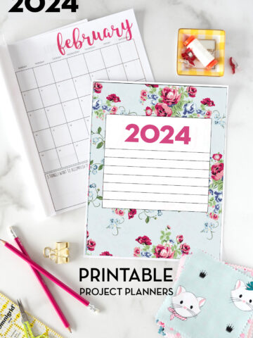 printed out planner pages on white table