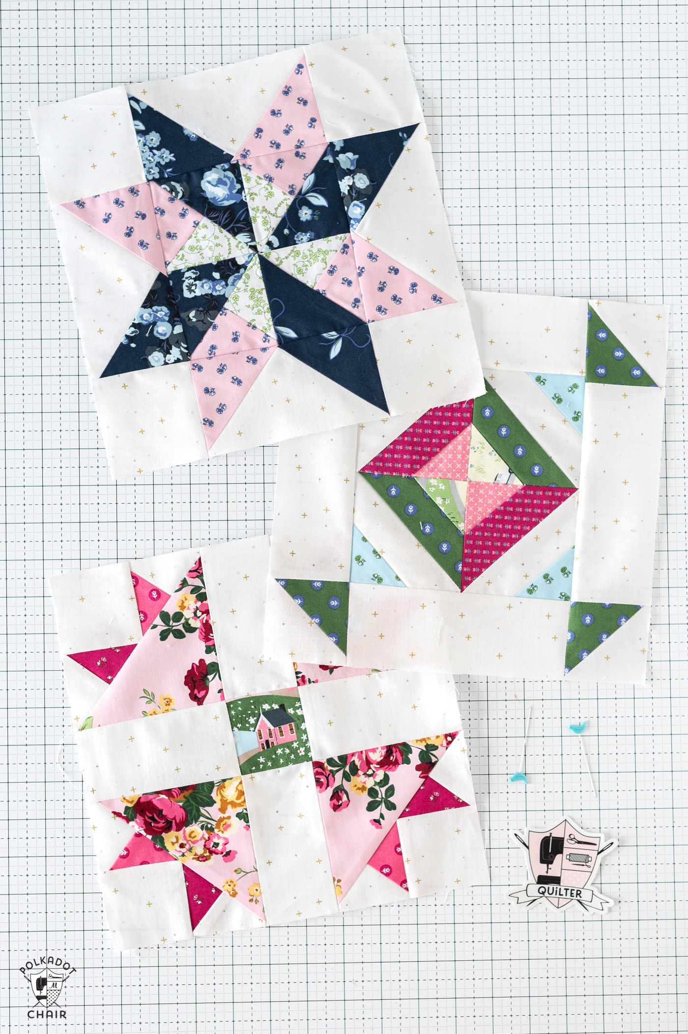 three colorful quilt blocks on a white cutting mat