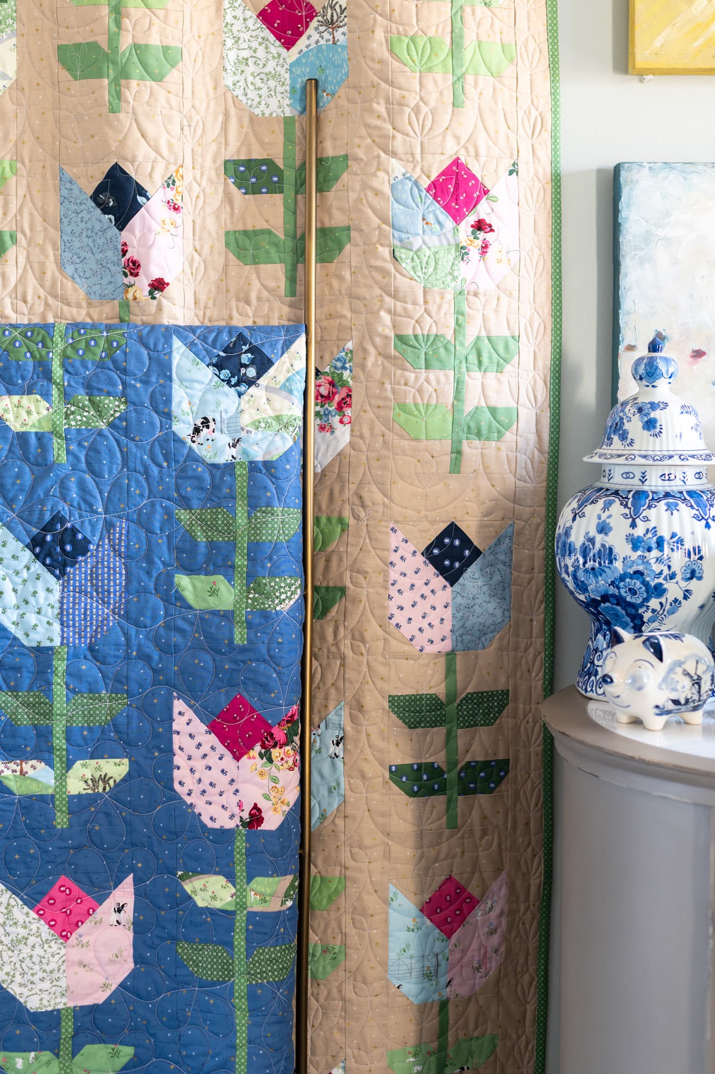 tulip quilts hanging on wall