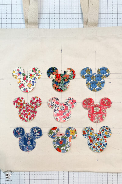 mickey fabric shapes arranged on tote bag