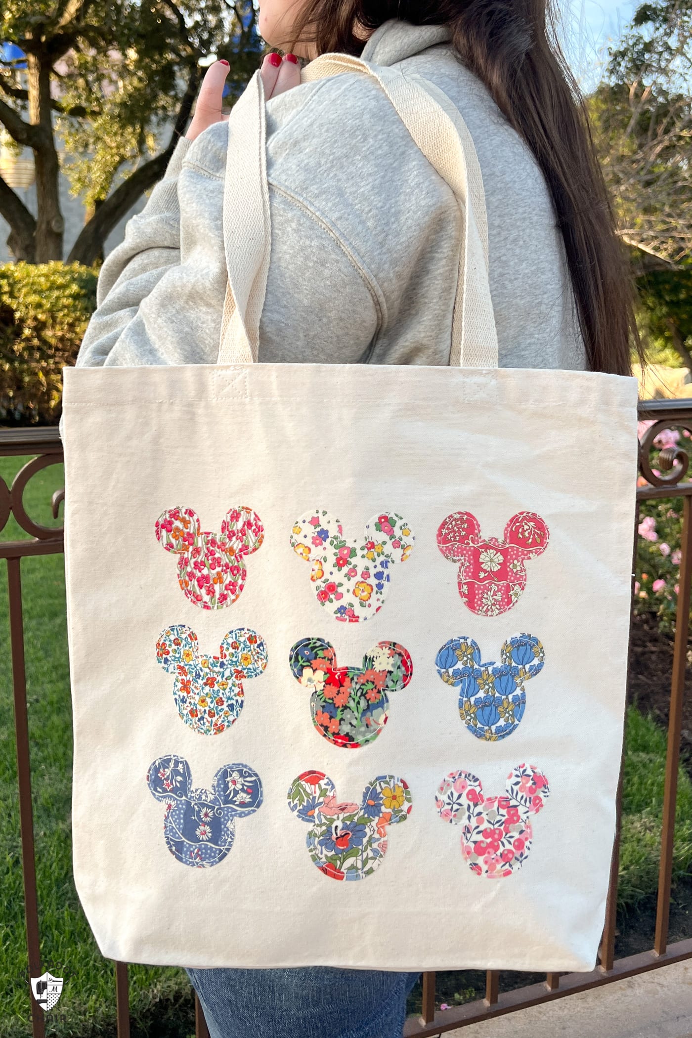 canvas tote bag with many floral mickey mouse shapes