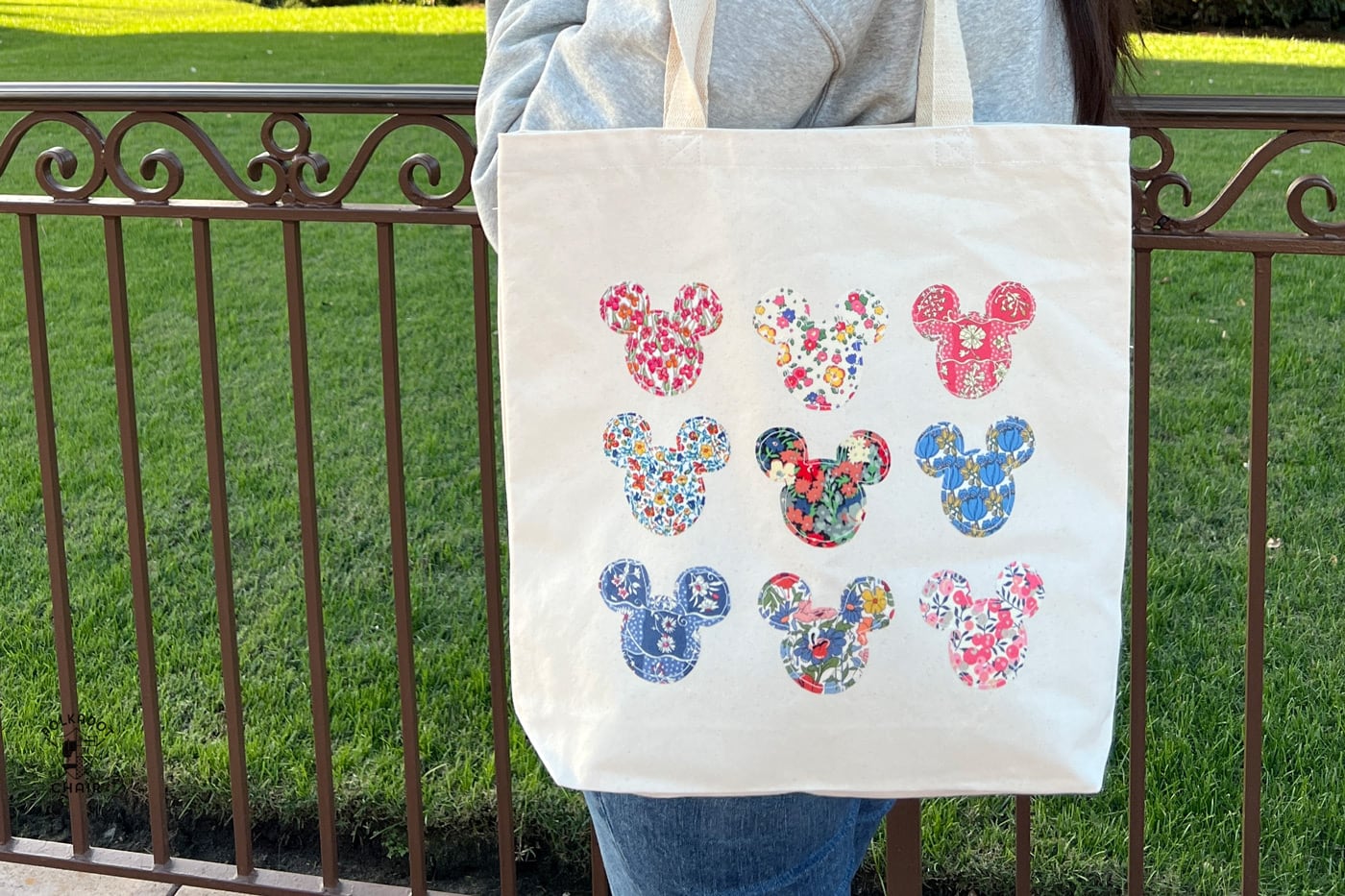 canvas tote bag with many floral mickey mouse shapes