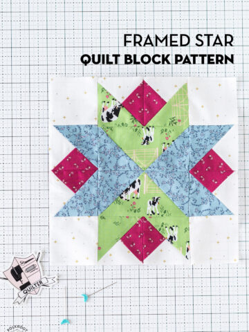 blue, red and green star quilt block on white cutting mat