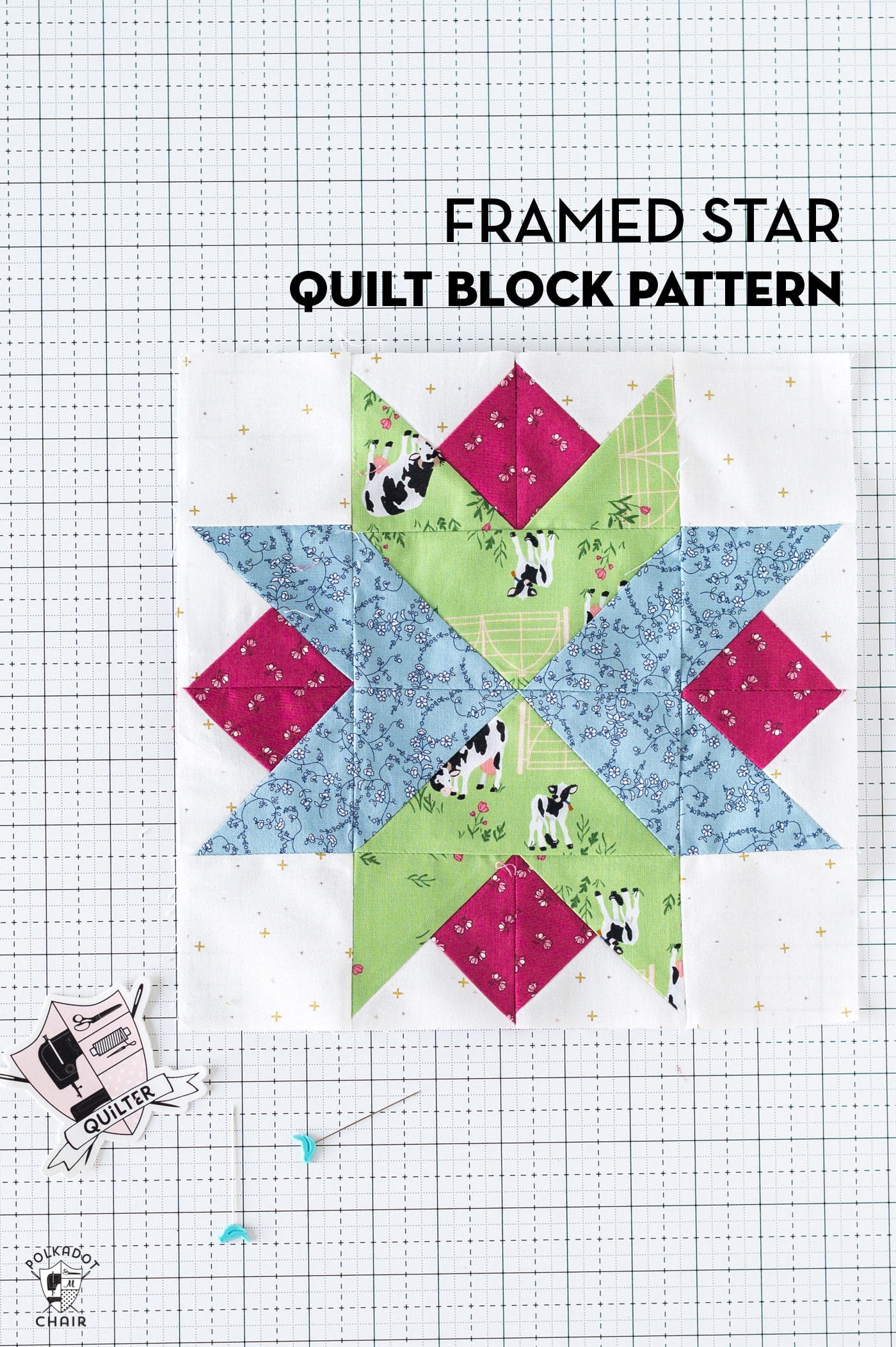 blue, red and green star quilt block on white cutting mat 