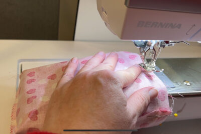 fabric under sewing machine foot