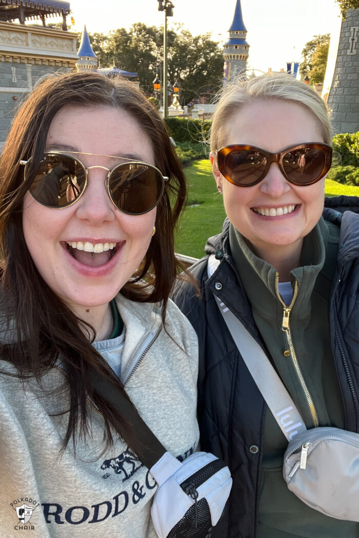 two women smiling in disney world