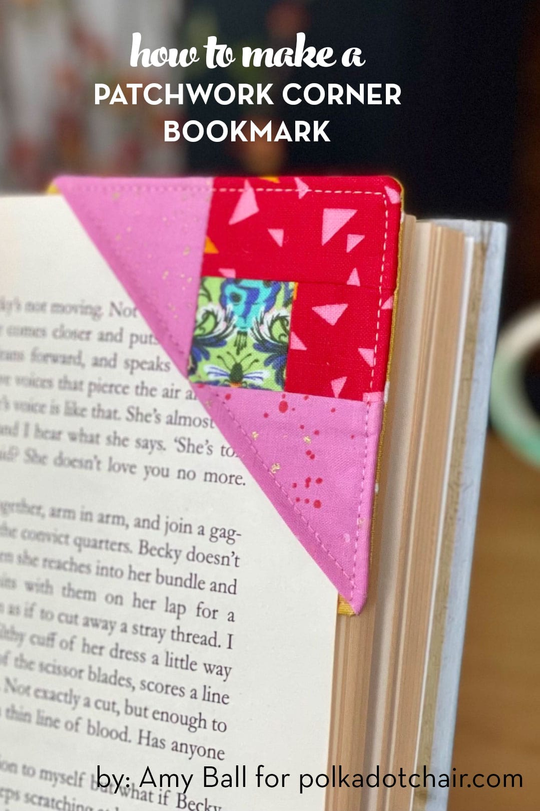 pink and red corner bookmark on corner of book page