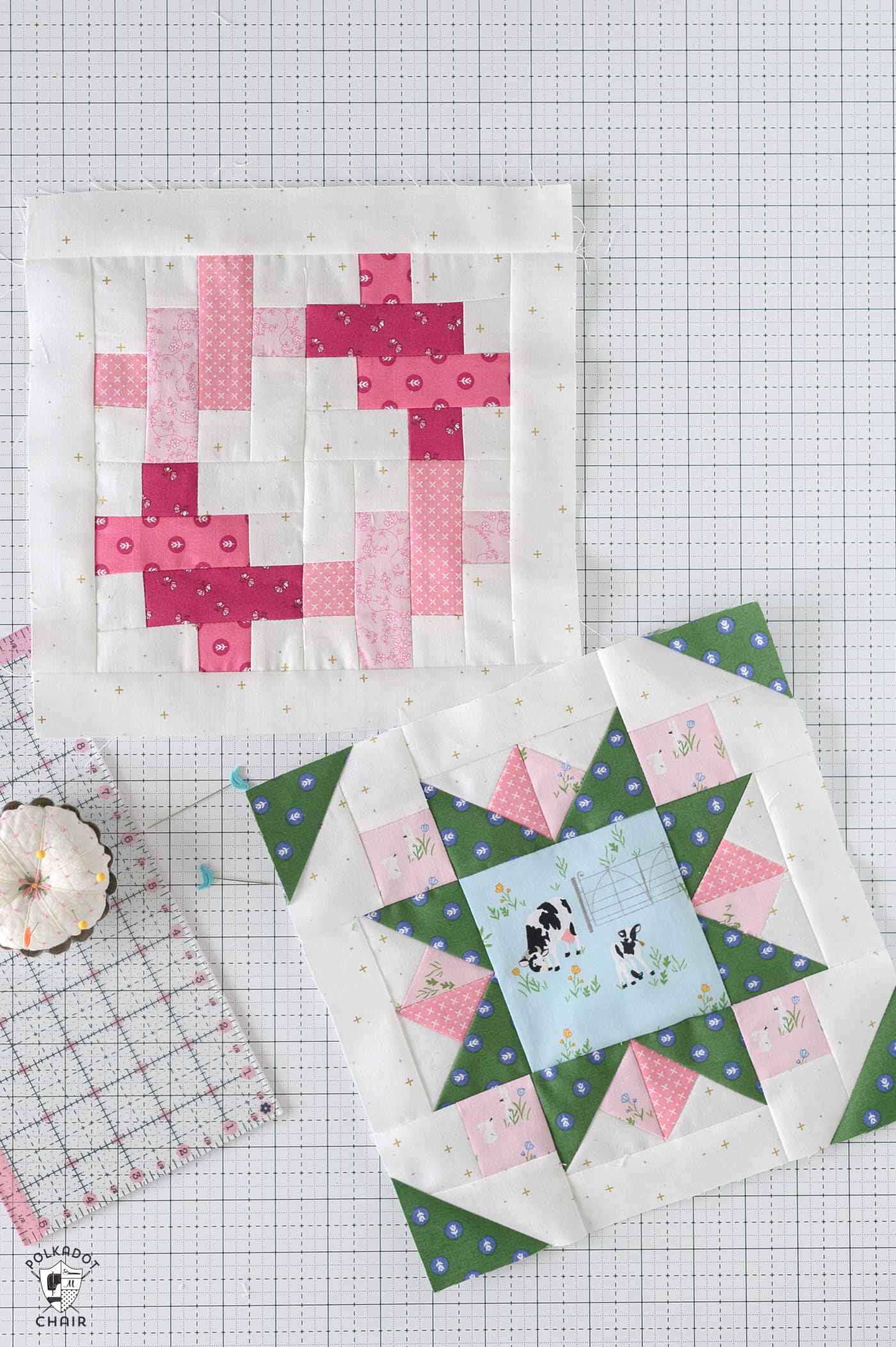 two quilt blocks on white cutting mat