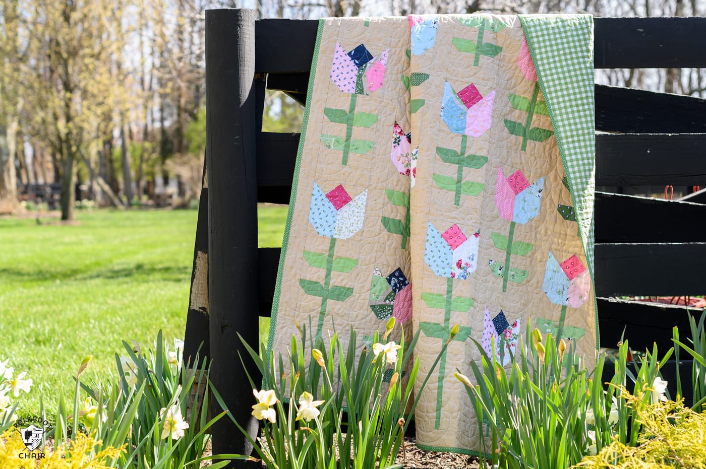 Tulip quilt in garden with daffodils