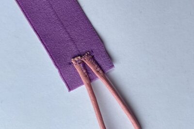 purple fabric on white table