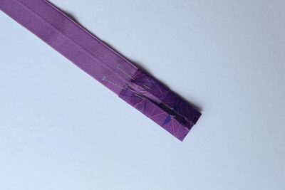 purple fabric on white table