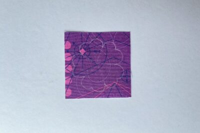 purple fabric on white table