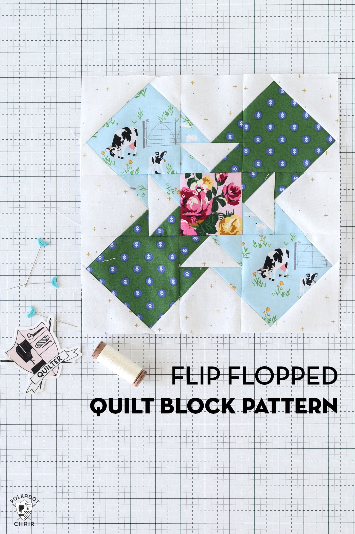 green and blue quilt block on white cutting mat