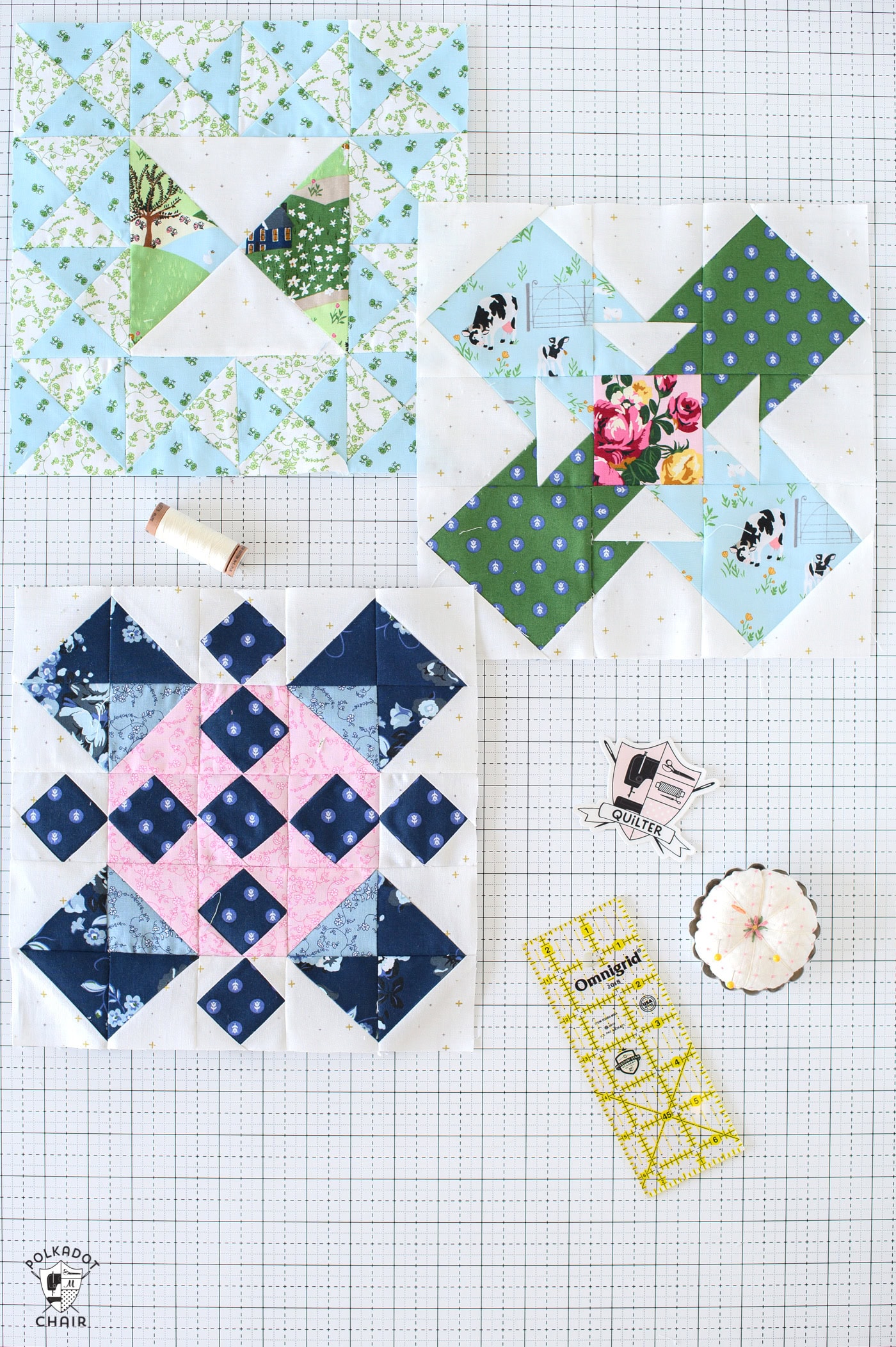 green and blue quilt block on white cutting mat