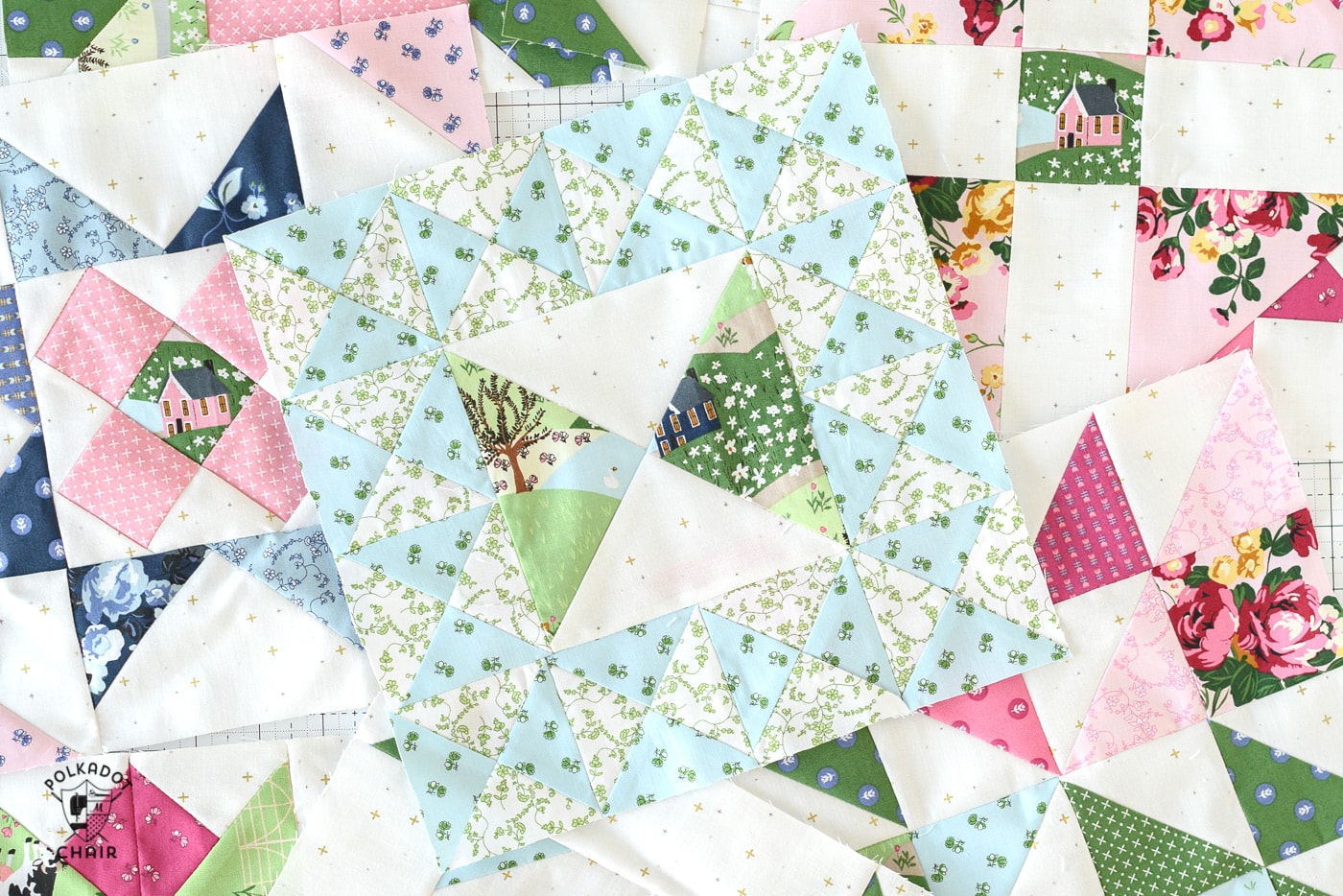 multiple colorful quilt blocks on cutting mat