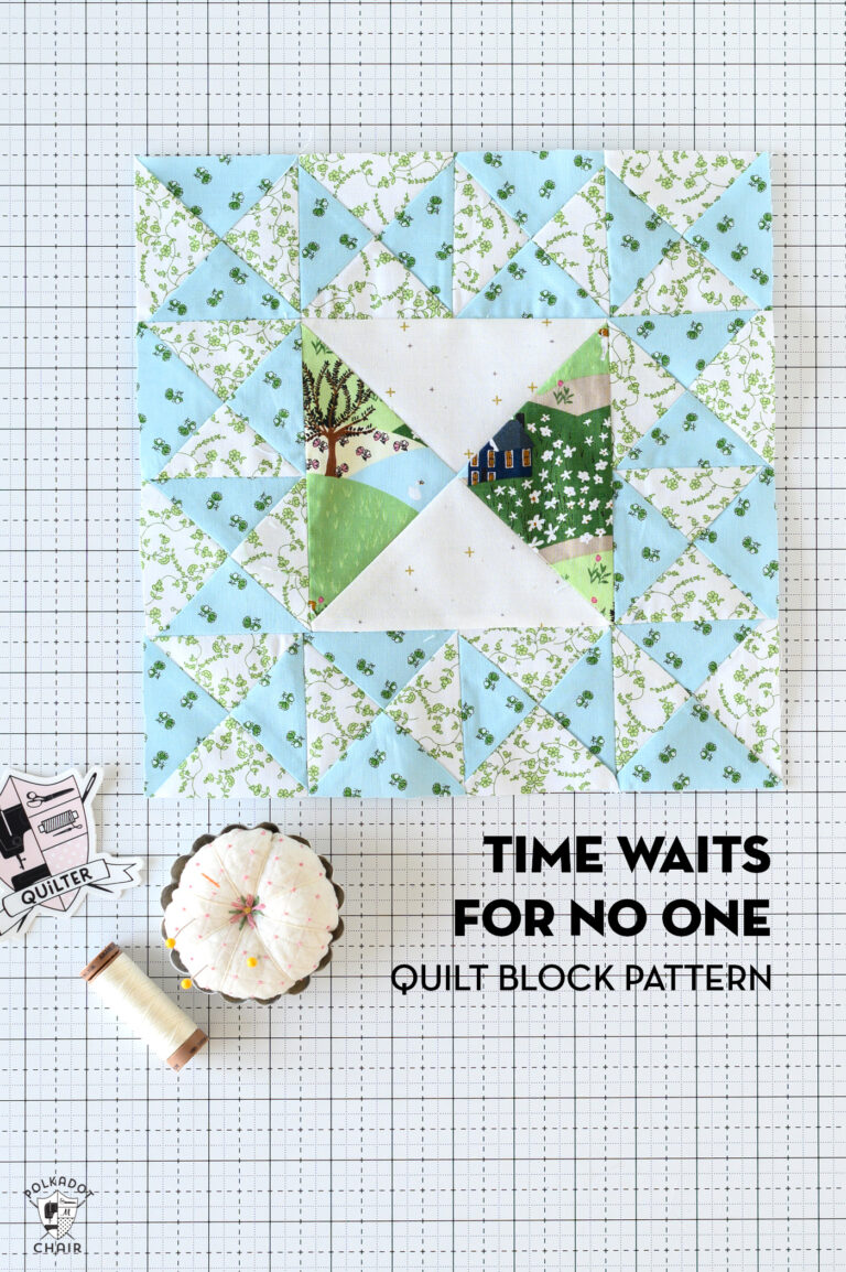 blue and green quilt block on white cutting mat