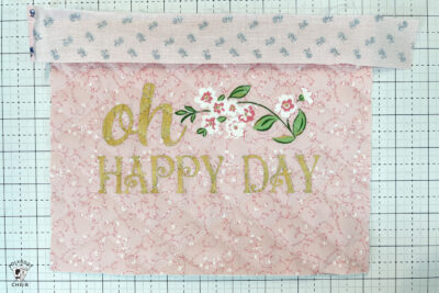 pink bag during construction process on white cutting mat