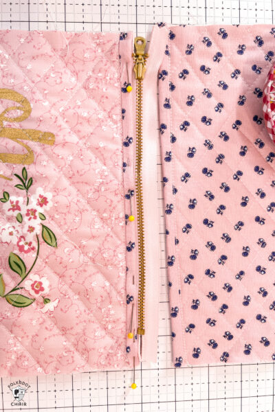 pink bag during construction process on white cutting mat with zipper