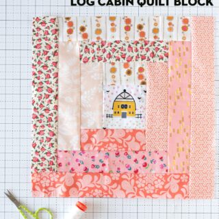 log cabin quilt block on cutting mat in orange and cream