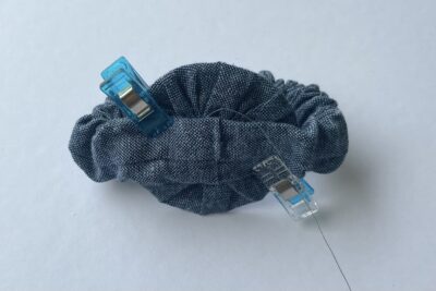 scrunchie with blue binding clips