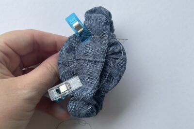 scrunchie with blue binding clips