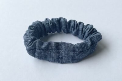 sewn blue scrunchie on table