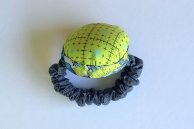 blue and green pincushion during construction steps; finished