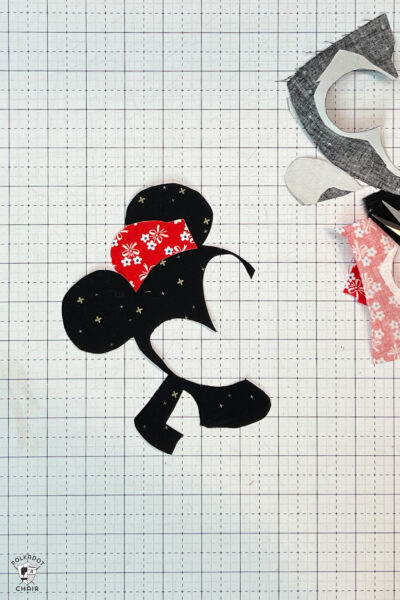 cut out applique images on white cutting mat