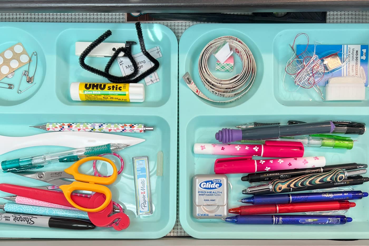 blue plate dividers in drawer with sewing notions